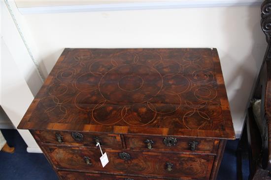 A William & Mary oyster veneered chest, W.2ft 8in. D.1ft 10in. H.2ft 4in.